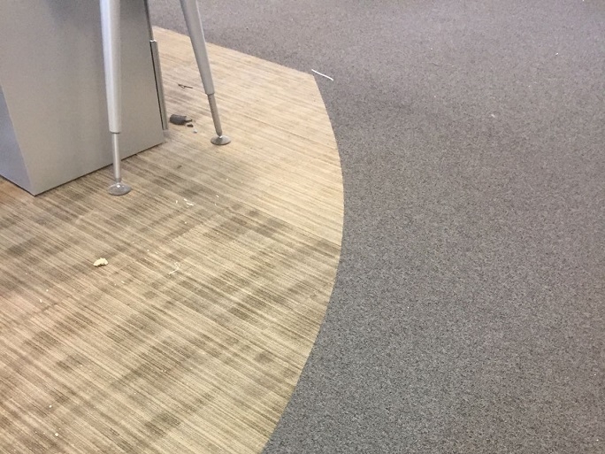 A close-up of the two different carpet tiles we installed.