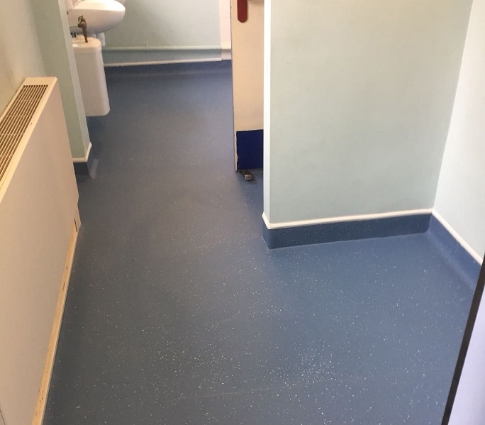 The safety flooring we installed in the bathroom.