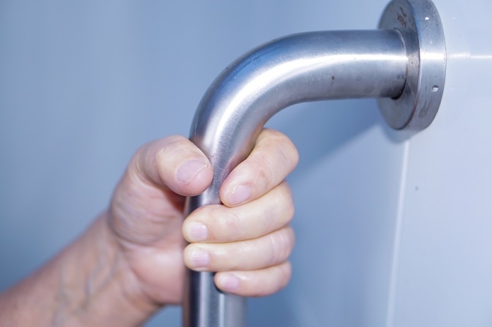 Elderly person in wet room.