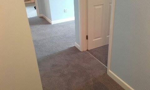 Hallway carpet installation phase 3 - laying the new carpet
