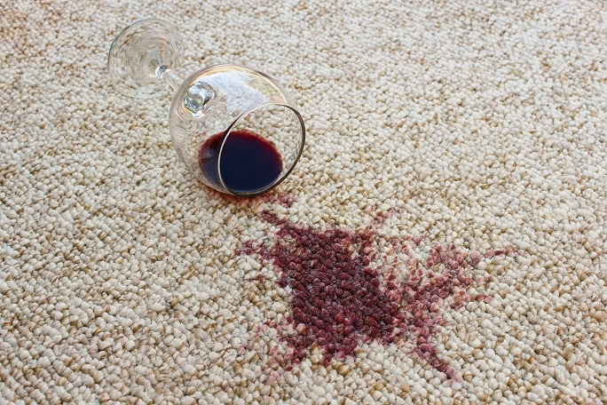 Red wine spilt on carpet.