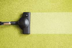 Cleaning a carpet with a vacuum