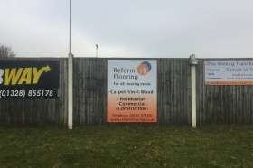 Reform Flooring's advertising board at Fakenham Football Club
